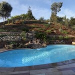 a good swimming pool contractor can utilize existing equipment when adding water features